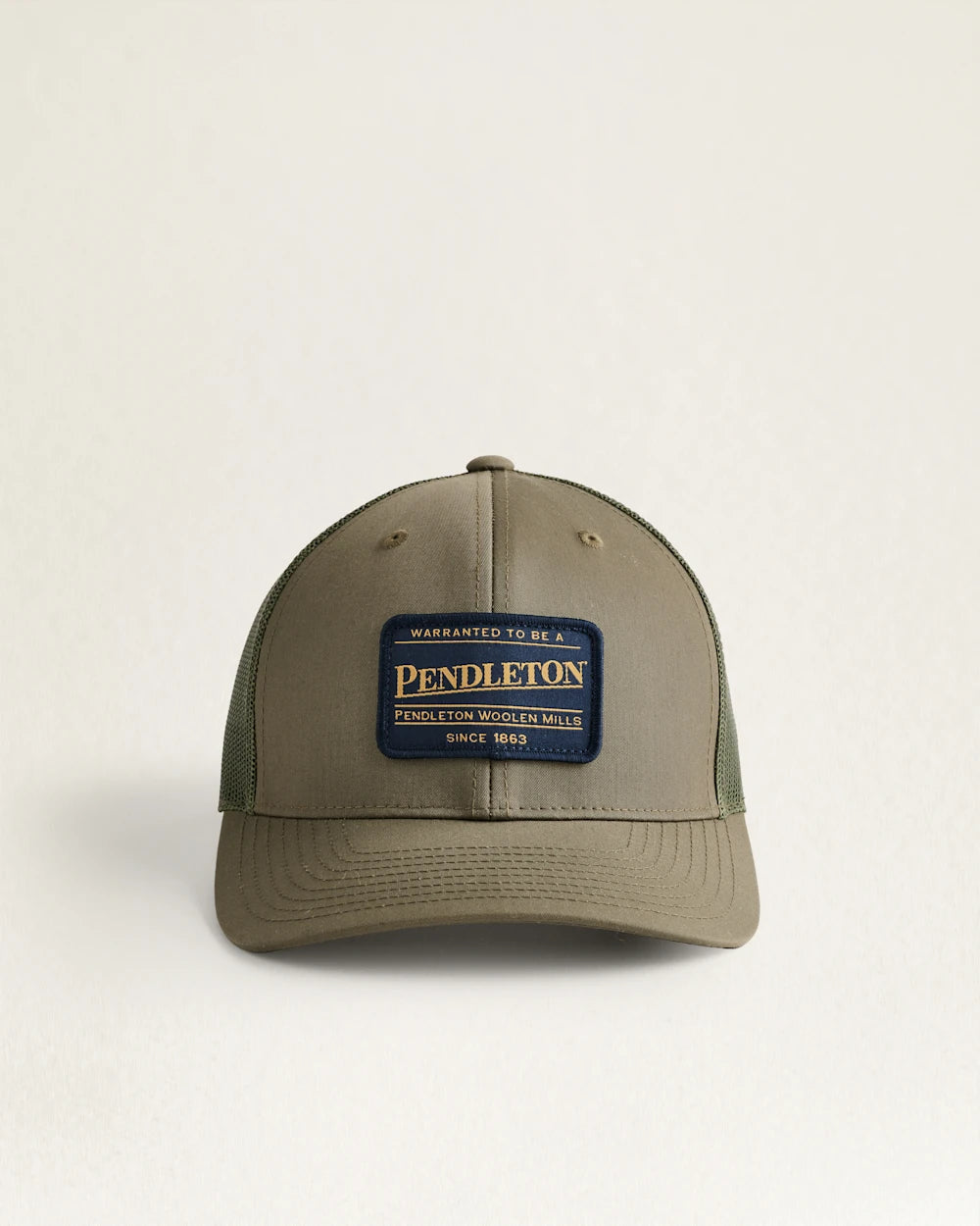 green trucker hat with classic Pendleton logo patch, and adjustable snap-back closure