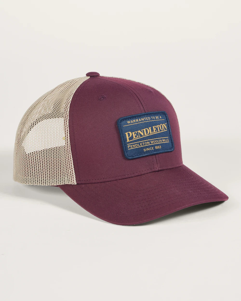 maroon and beige trucker hat with ckassic pendleton logo patch and adjustable snap closure 