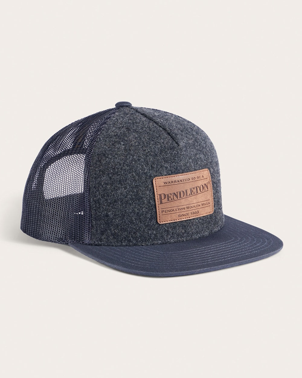wool front trucker hat with adjustable snap closure 